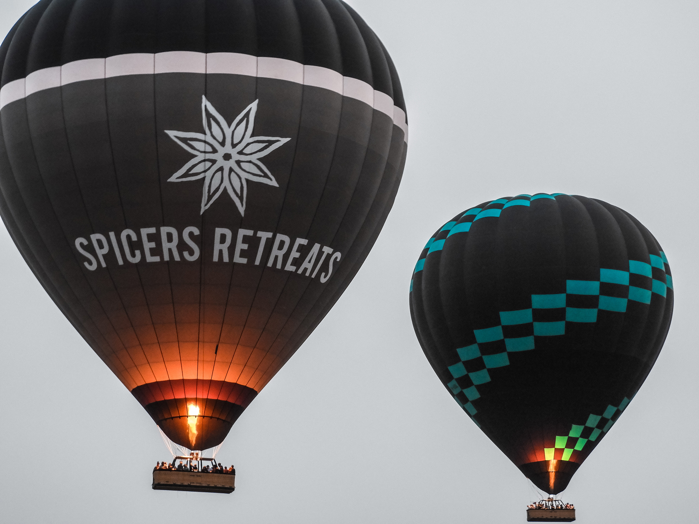 spicers retreats and black and blue balloon flying